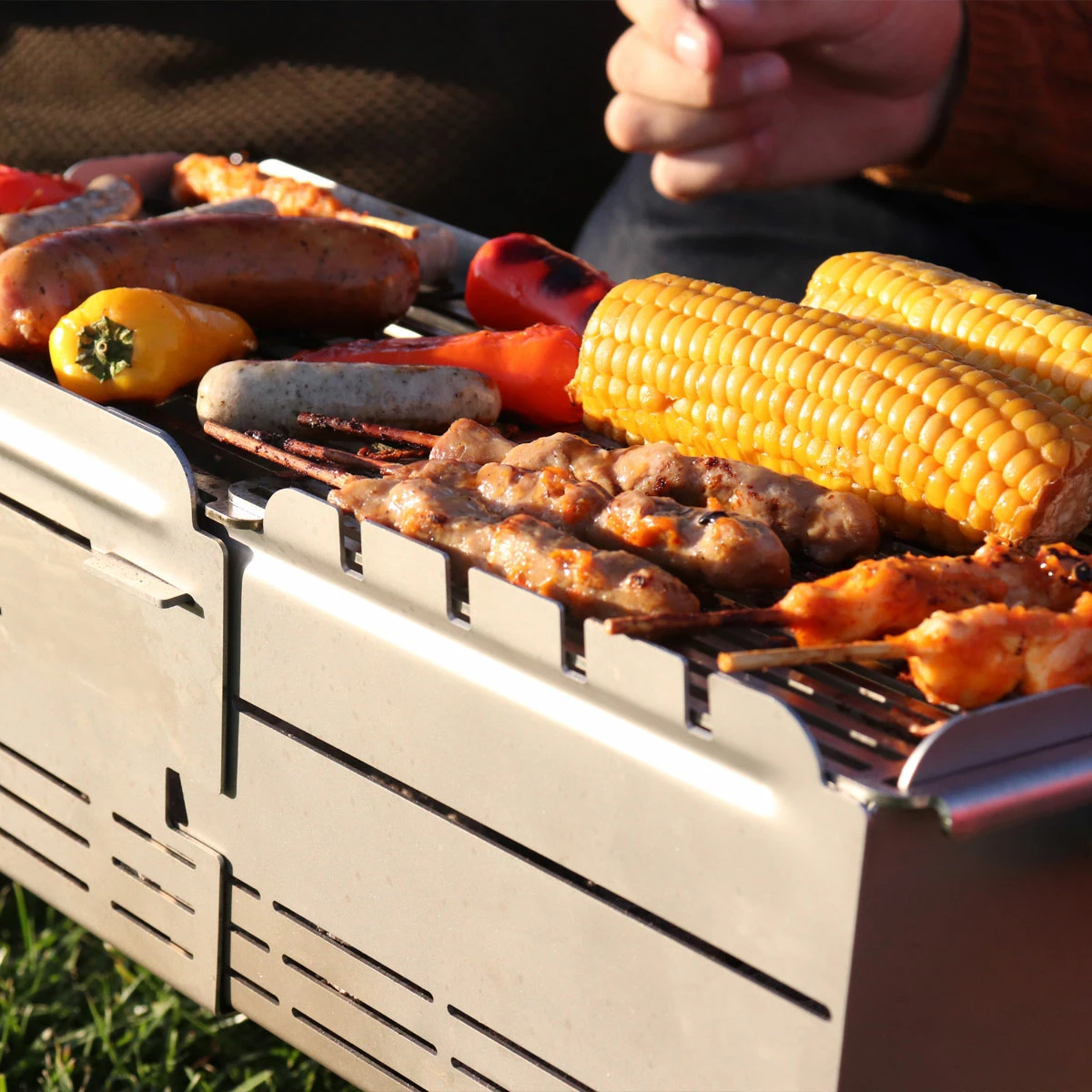 Knister Grill Premium – Tragbarer Holzkohlegrill Aus Edelstahl 9 Knister Grill Premium – Tragbarer Holzkohlegrill Aus Edelstahl – Bild 9